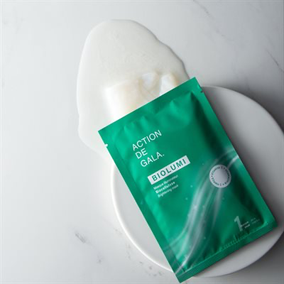 "An easliy opened pouch of BioLumi BioCellulose Brightening Mask by Action de Gala, a hydrating and brightening facial mask, available at A & E Beauty Supplies"