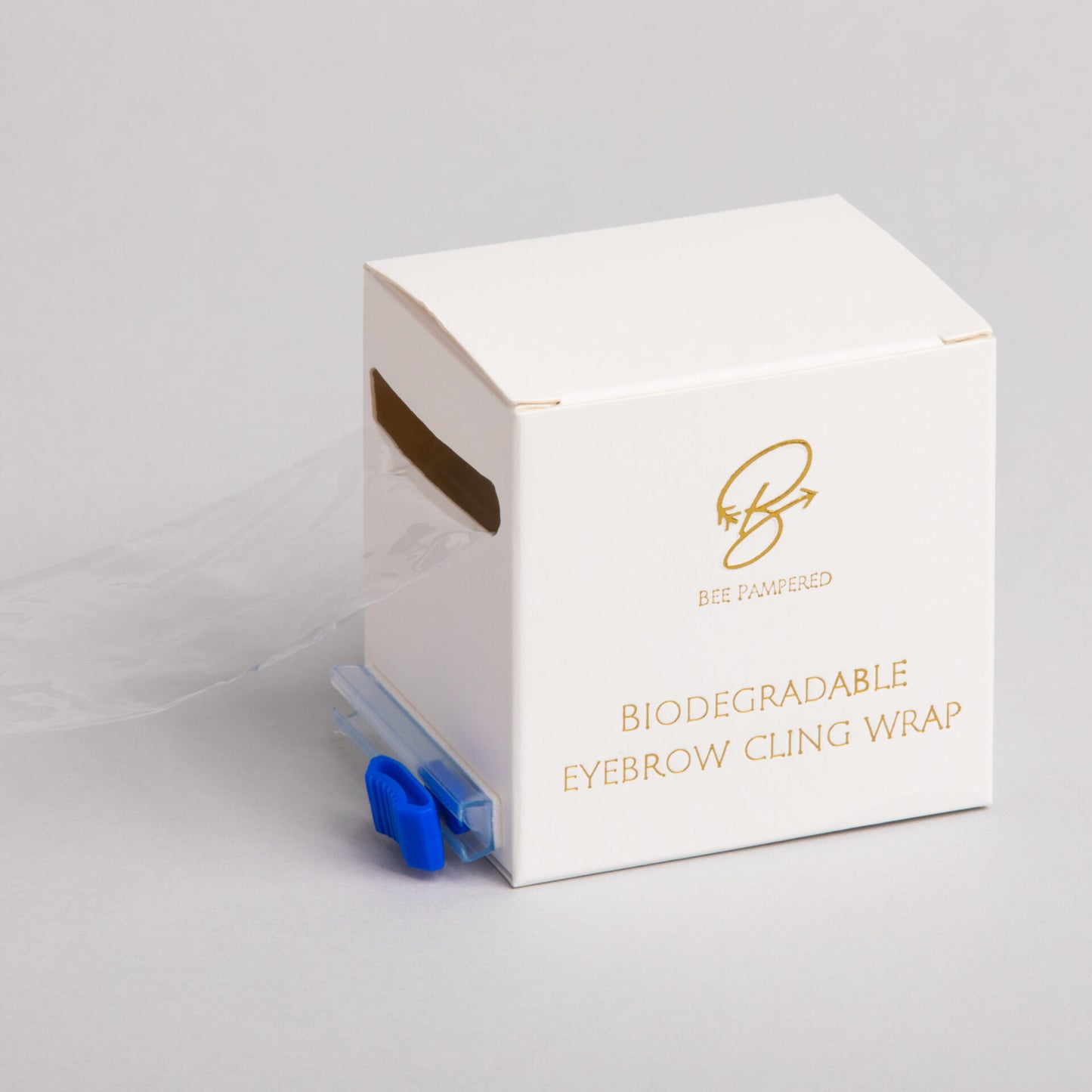 Biodegradable cling film roll, eco-friendly and designed for use in beauty treatments like brow lamination and lash lifting, displayed on a clean, neutral background