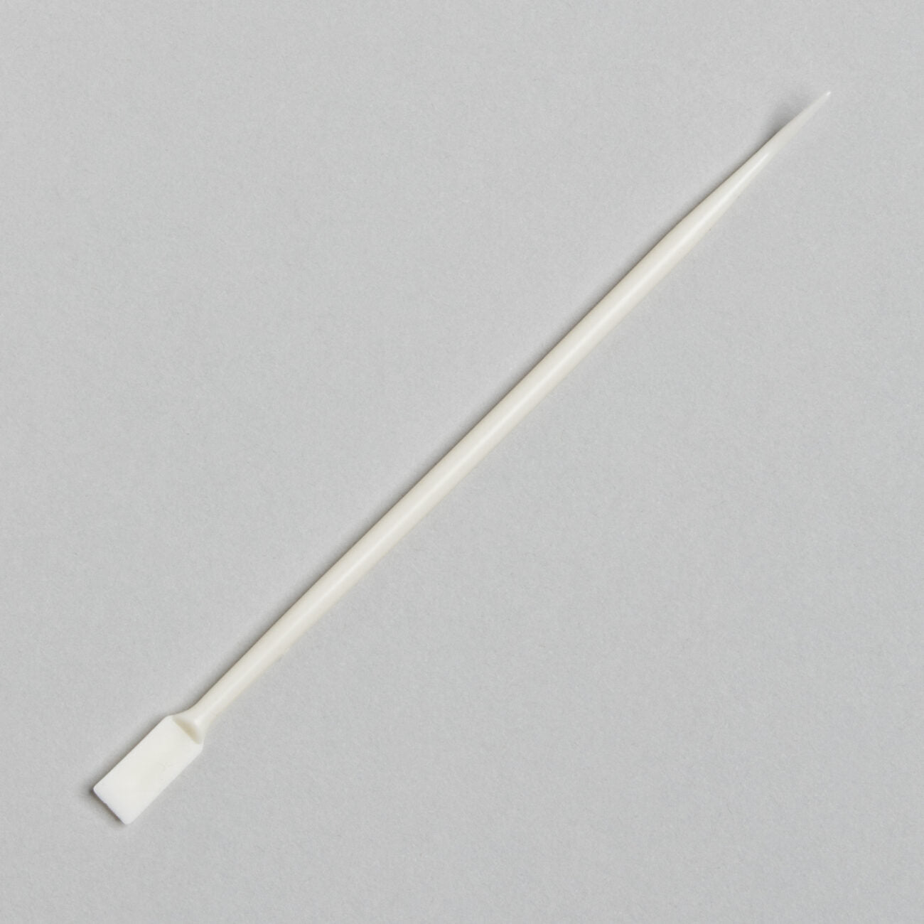 Ergonomic Lash Lifting Tool with a sleek stainless-steel design, featuring a curved tip for precise lash separation during lash lift treatments.
