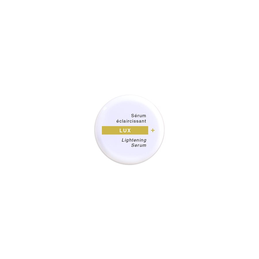 "A bottle of Lux Lightening Syrum by Action de Gala, a brightening serum designed to reduce dark spots and even skin tone, ideal for facials and daily care, available at A & E Beauty Supplies"