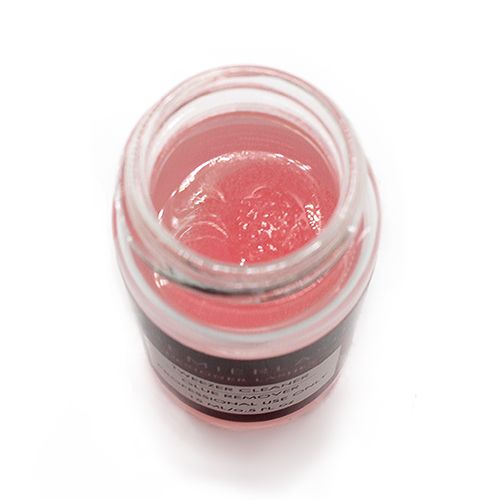 PremierLash Tweezers Cleaner Glue Remover in a compact, practical container, ideal for removing adhesive residue from lash tools, on a red background