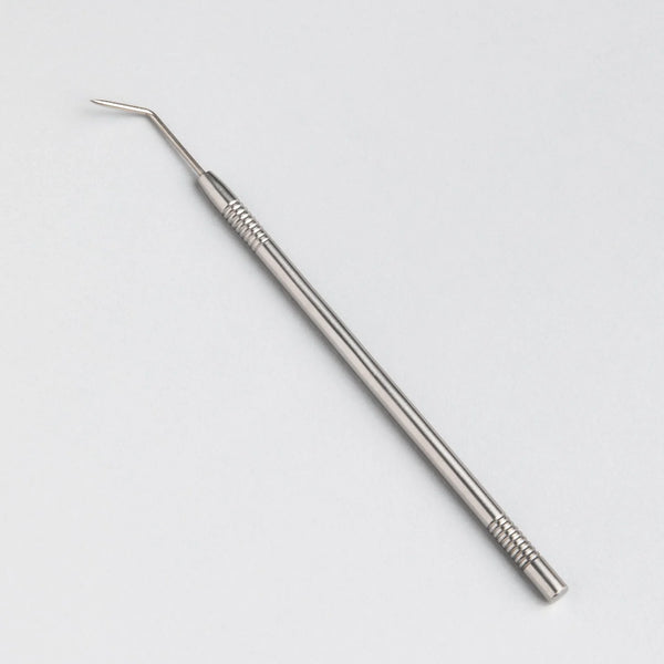 "Bee Pampered Precision Lash Lift Tool with fine tip for accurate lash separation, available at A & E Beauty Supplies. Silver tool on a white background"