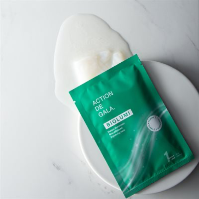 "An easliy opened pouch of BioLumi BioCellulose Brightening Mask by Action de Gala, a hydrating and brightening facial mask, available at A & E Beauty Supplies"
