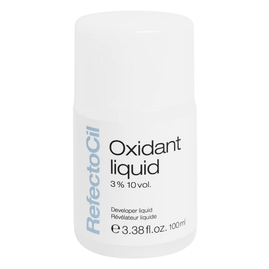 White 100ml bottle of RefectoCil Liquid Oxidant with a blue label, formulated for mixing with RefectoCil tints to activate color for lash and brow treatments.