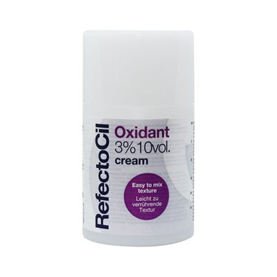 "A bottle of RefectoCil Oxidant Cream, 100ml, designed for use with brow and lash tints, featuring sleek white packaging with black and blue accents, displayed on a clean, neutral background."