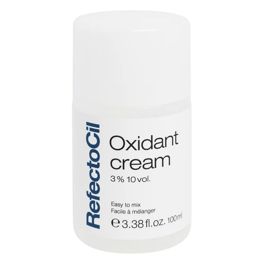 White 100ml bottle of RefectoCil Oxidant Cream with a blue label, designed for professional brow and lash tinting.