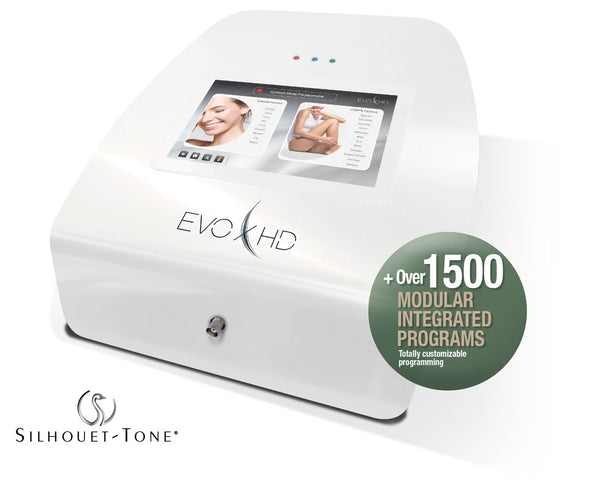 "The Silhouet-Tone Evolution 7 HD electrolysis device features a sleek white square body with rounded edges and silver accents. It includes a digital touch screen, offering precision hair removal with three frequencies: 6.78 MHz, 13.56 MHz, and 27.12 MHz. Ideal for various hair types, this device provides advanced treatment options for professionals."