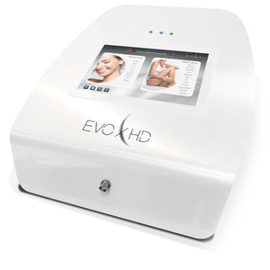 "The Silhouet-Tone Evolution 7 HD electrolysis device features a sleek white square body with rounded edges and silver accents. It includes a digital touch screen, offering precision hair removal with three frequencies: 6.78 MHz, 13.56 MHz, and 27.12 MHz. Ideal for various hair types, this device provides advanced treatment options for professionals."