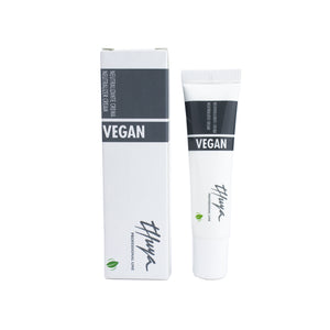 "Thuya Vegan Lash & Brow Neutralizer Cream, a creamy solution used to neutralize and set lash and brow perms, providing long-lasting results. White tube in a cardboard box with grey letters"