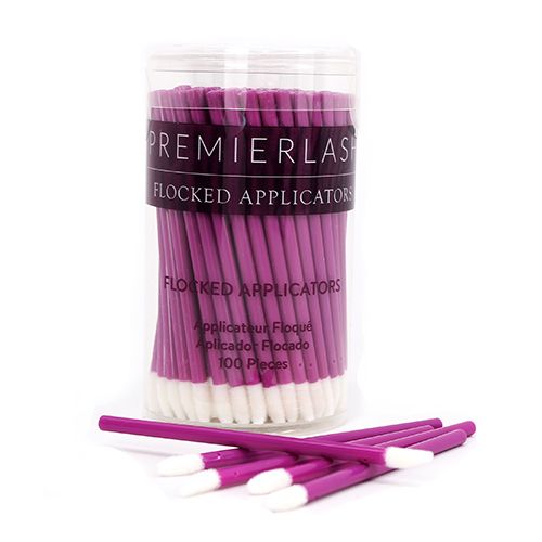 Flocked Applicators (Qty 100) by PremierLash, ideal for precise application of lash and brow products, displayed on a clean, neutral background, pink stick with a white soft tip in a plastic container