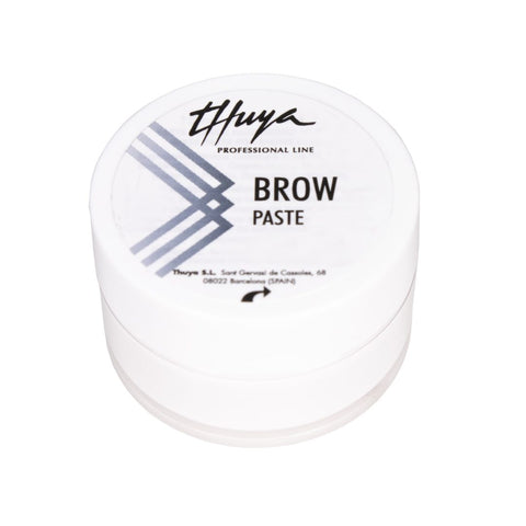 "Thuya Brow Paste, 15ml white sculpting cream in a compact container, ideal for defining brows during brow shaping and lamination treatments. A white cylinder
with a twist top lid"