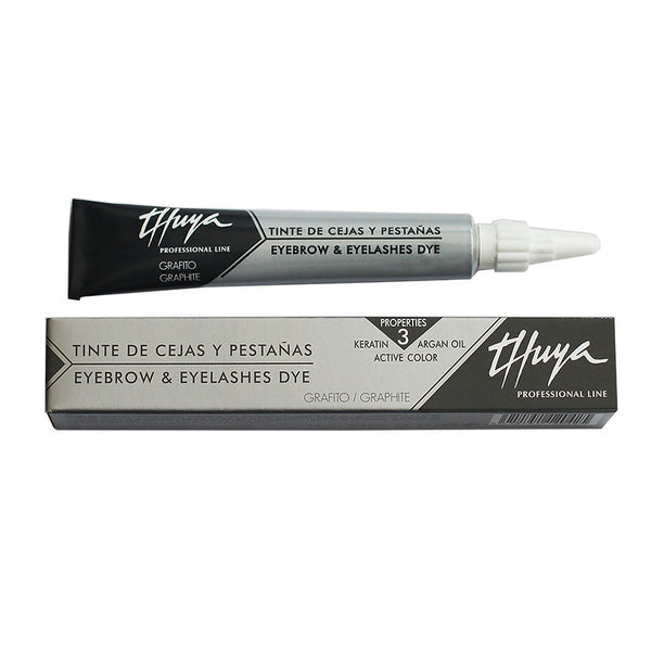 A 14ml tube of Thuya Display Lash & Brow Tint in graphite, a professional-grade tint for long-lasting color. The tube features a sleek, modern design with a black and gold label, highlighting the rich color inside. This tint is used for brow tinting and lash tinting services to achieve a deep, bold, and natural finish. The tube is set against a clean, white background, emphasizing the high-quality and professional nature of the product.

