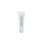 "Yi-Zhibaume Refreshing, Calming & Purifying Cream/Balm by Action De Gala in a jar with a white lid, ideal for soothing sensitive and irritated skin."